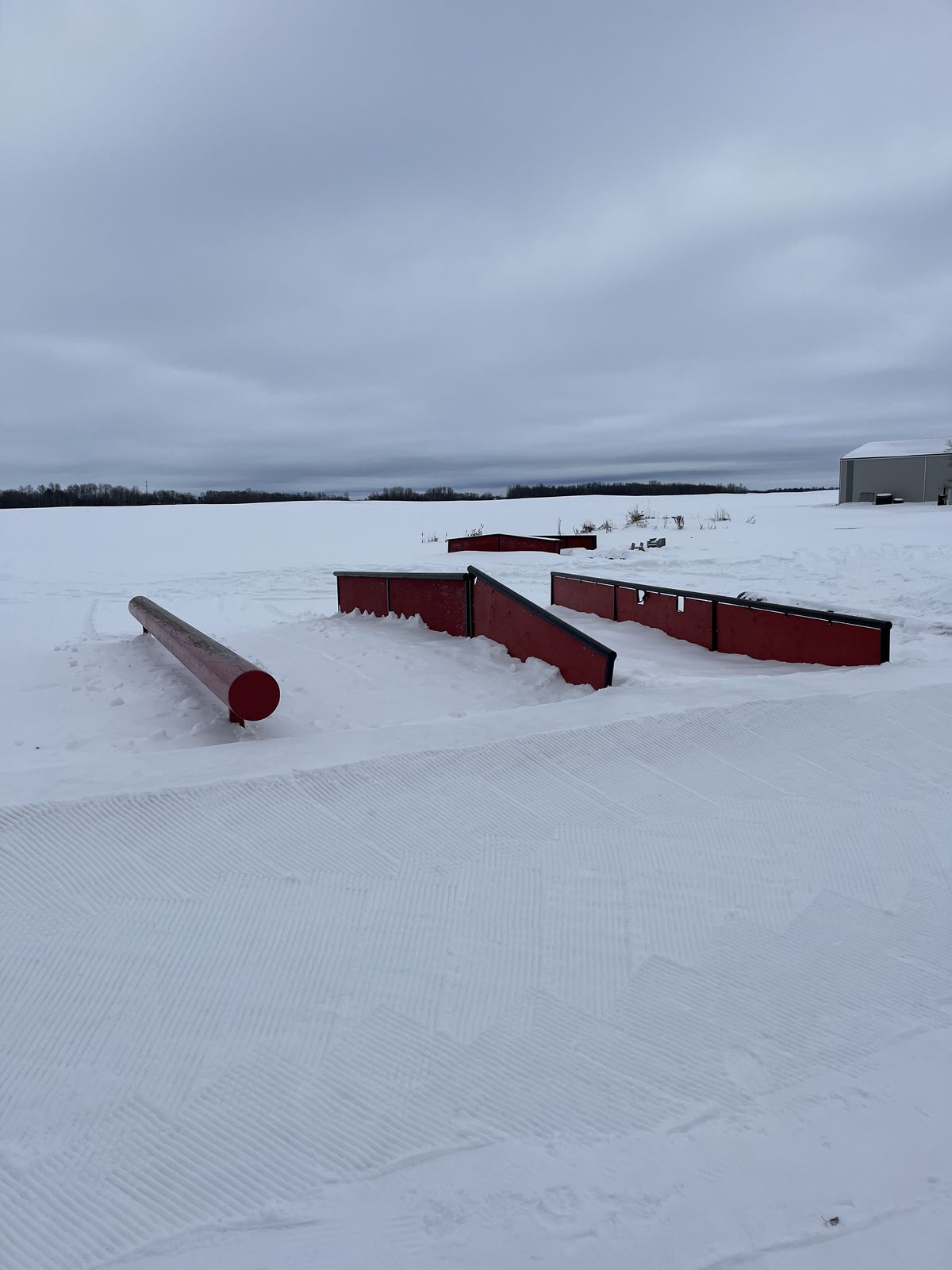 Red box features set up on a snowy field
