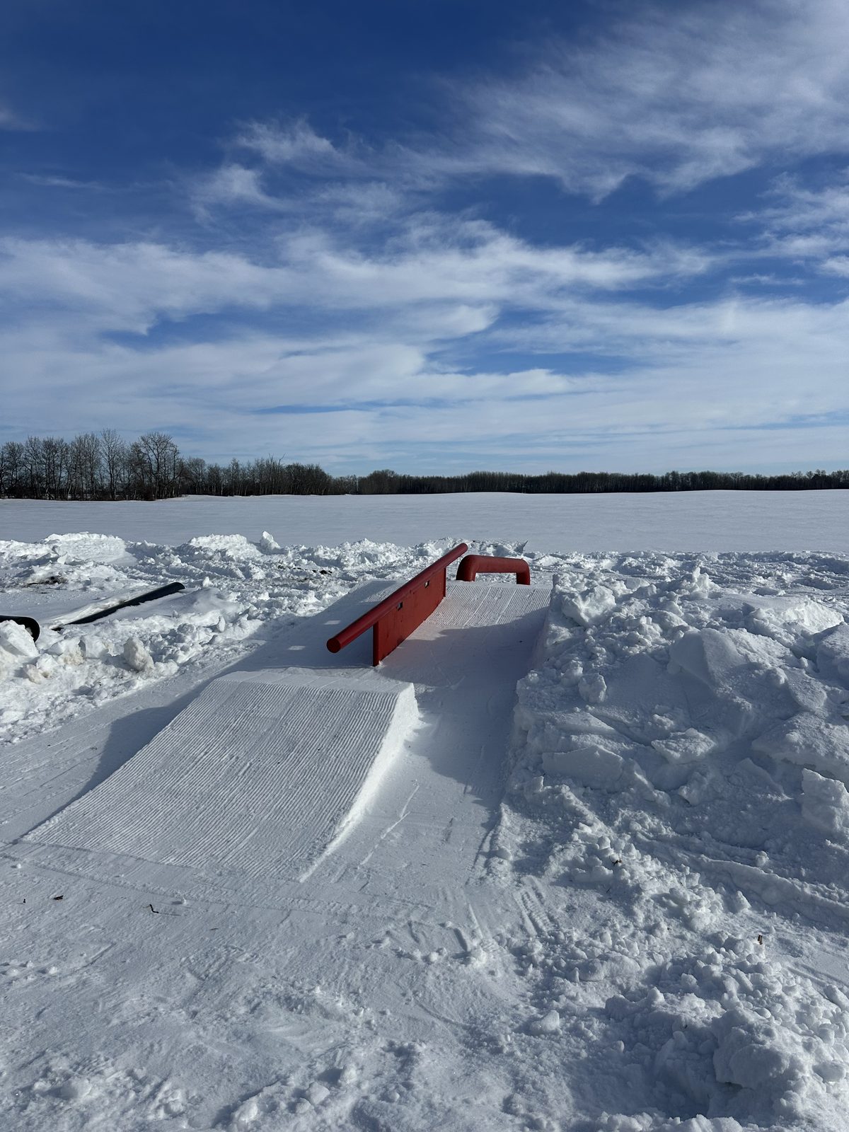 Red down rail feature set up on snow